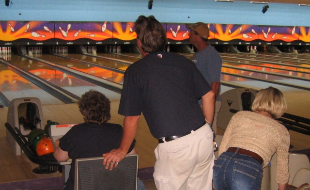 LHS Class of 77 reunion team multitasks at the bowling alley -- No ambulances were required!